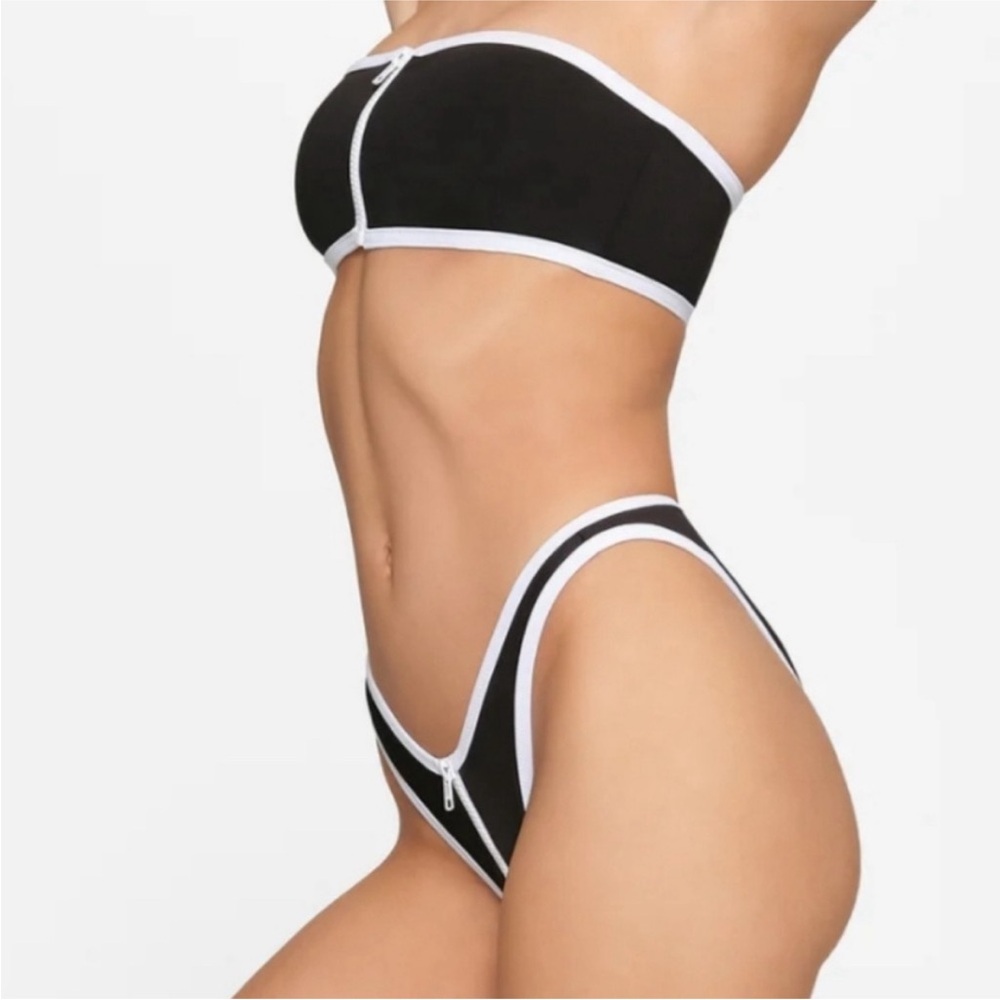 SKIMS SPORTY ZIPPER SWIM BANDEAU & TANGA CHEEKY BOTTOMS. SOLD OUT ONLINE